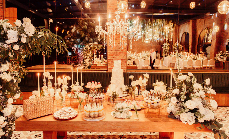 Bride and wedding planner from Wink sharing an emotional moment during wedding preparations.